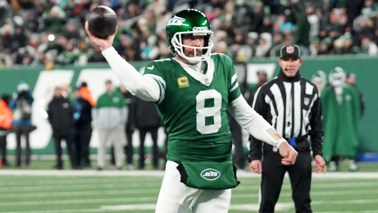 New York Jets quarterback Aaron Rodgers (8) throws his 500th career touchdown pass in the second quarter of the game against the Miami Dolphins on Jan. 5, 2025, in East Rutherford, N.J.