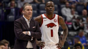 John Calipari and Johnell Davis on the Arkansas bench.