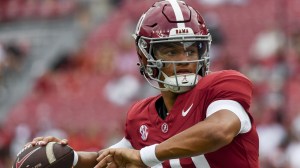 Alabama QB Austin Mack warms up before a game.