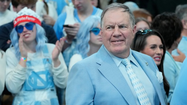 Football coach Bill Belichick attends a North Carolina basketball game.