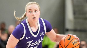 TCU women's basketball star Hailey Van Lith dribbles during a game.