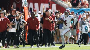 Alabama QB Jalen Milroe runs against Michigan.