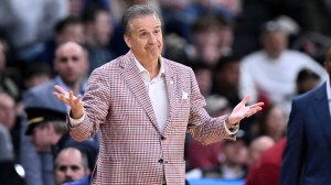 John Calipari reacts from the sidelines during an Arkansas basketball game.