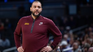 Minnesota basketball coach Ben Johnson on the sidelines.