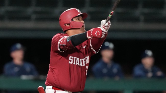 Stanford baseball player Rintaro Sasaki swings at the plate.