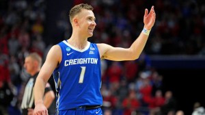 Creighton guard Steven Ashworth waves to the crowd.