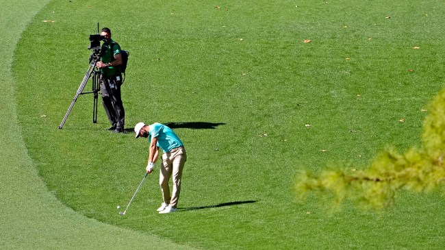 Dustin Johnson hits from the rough at The Masters