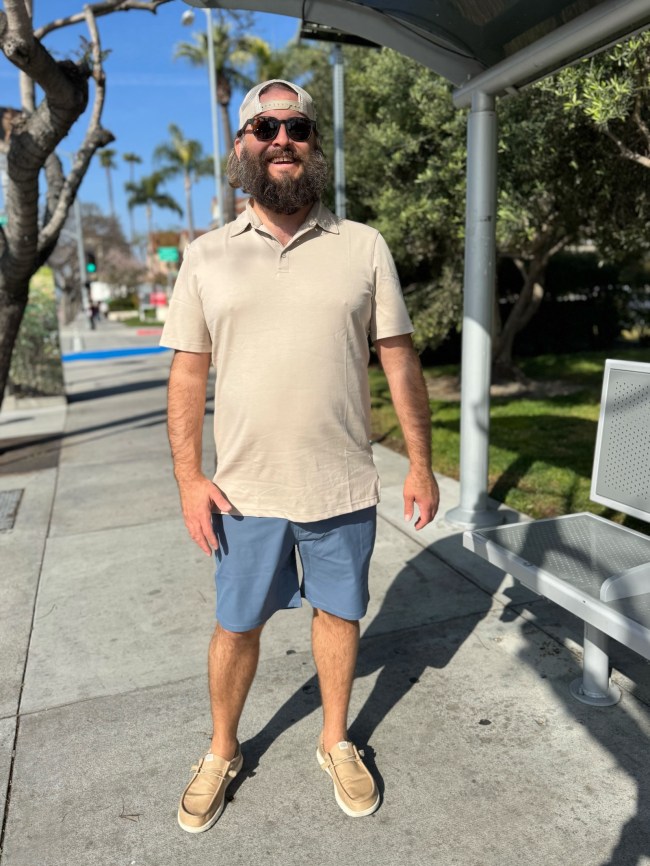 Man wearing Jack Archer shorts and polo