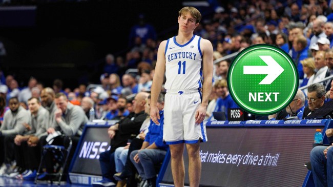 Kentucky basketball player Travis Perry checks into a game.