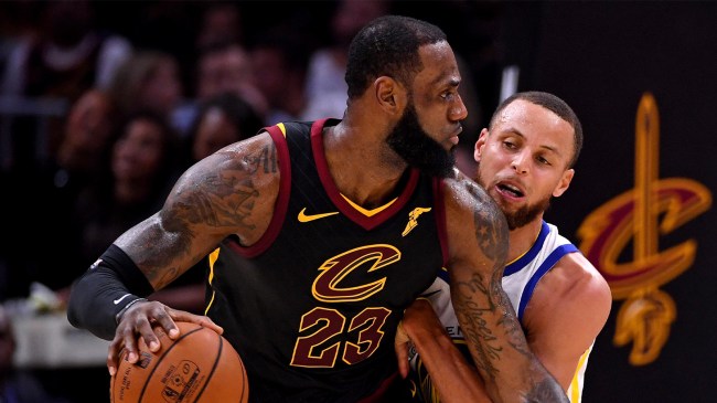 Steph Curry guards LeBron James during 2018 NBA FInals