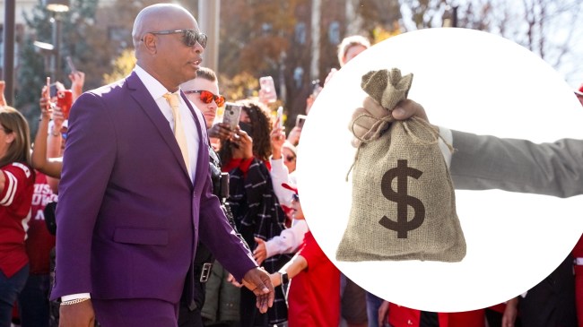 Mickey Joseph walks to the stadium before a Nebraska football game.