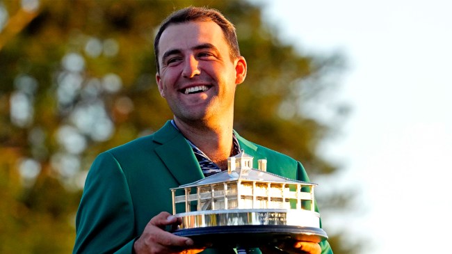 Scottie Scheffler holding The Masters trophy