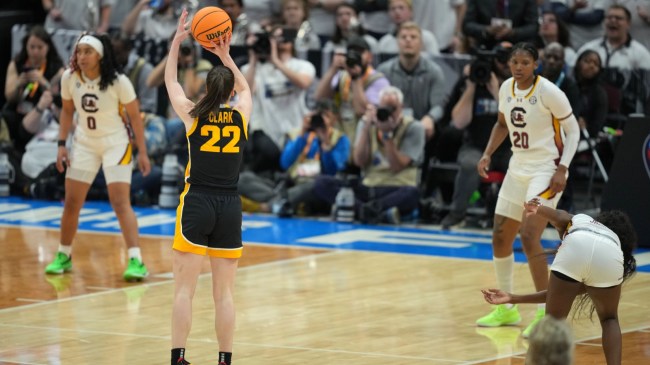 Caitlin Clark shoots during a basketball game between Iowa and South Carolina.