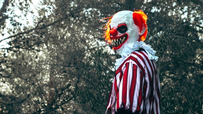 evil-clown-walking-in-the-woods