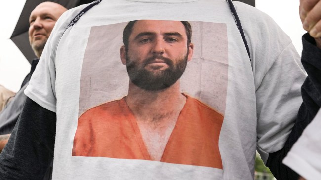 Scottie Scheffler mugshot on shirt at PGA Championship