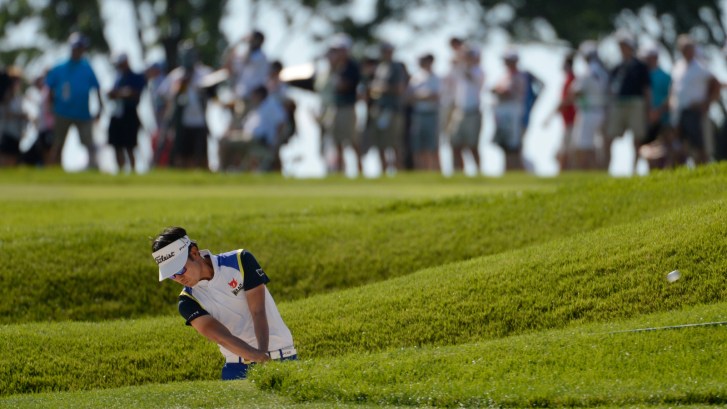 12th hole at Oakmont Country Club being played by Kevin Na
