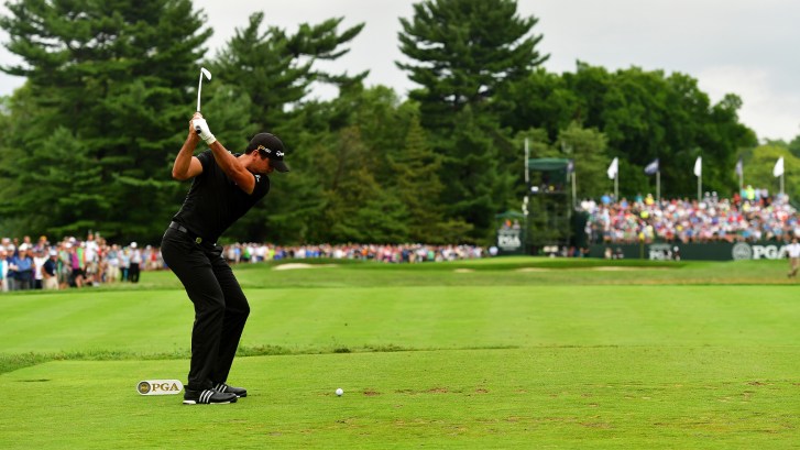 Jason Day tees off on 12th hole at Baltusrol