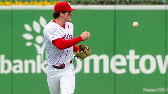 Roman Anthony tosses a baseball.