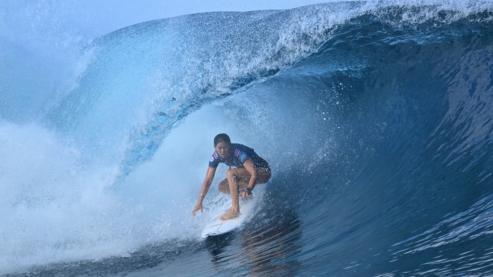 Professional surfer Bettylou Sakura Johnson in the Olympics at Teahupo'o