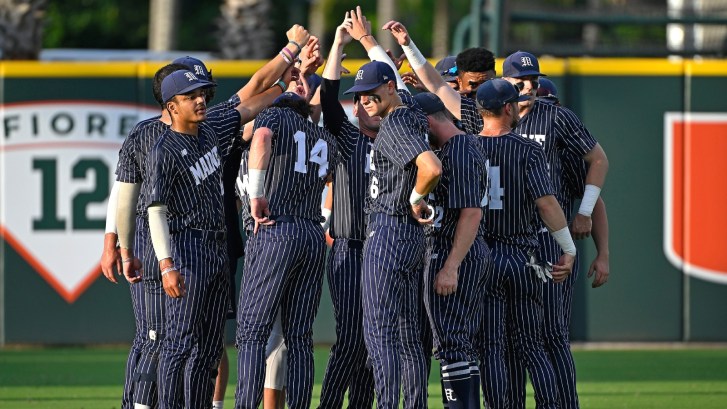 The Maine baseball team huddles