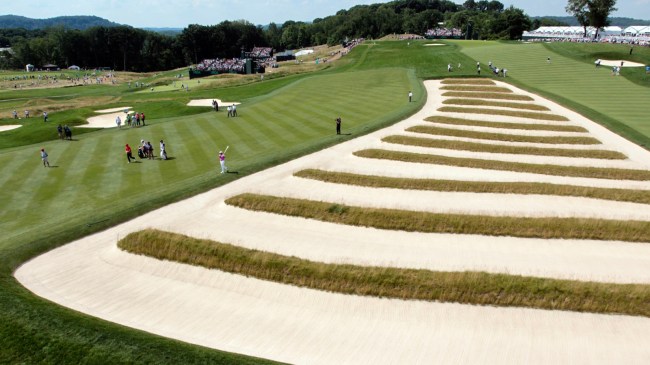 Jason Day takes a shot from the church pews at Oakmont.