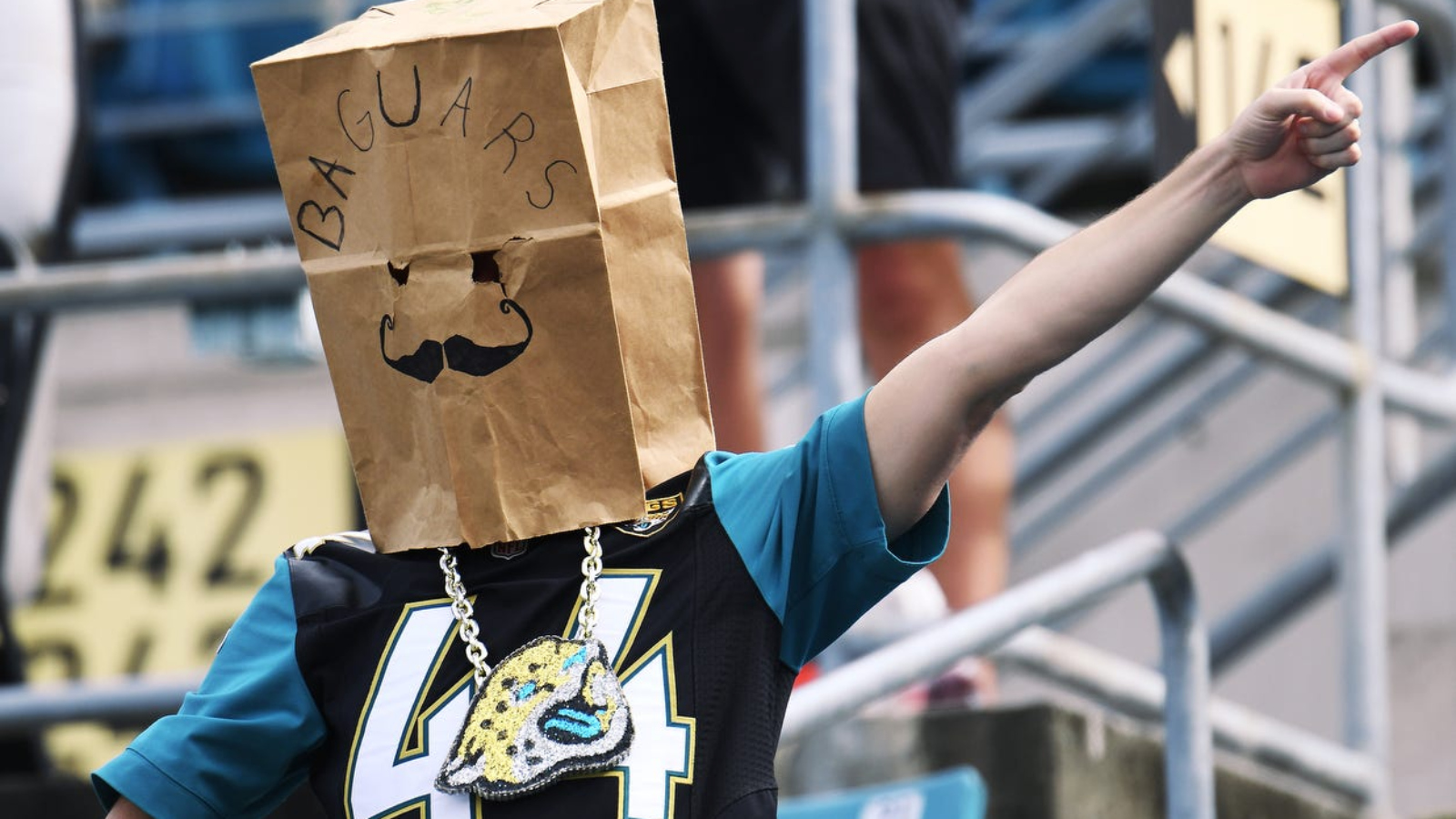 disgruntled Jacksonville Jaguars fan wears bag on head during historic NFL losing streak