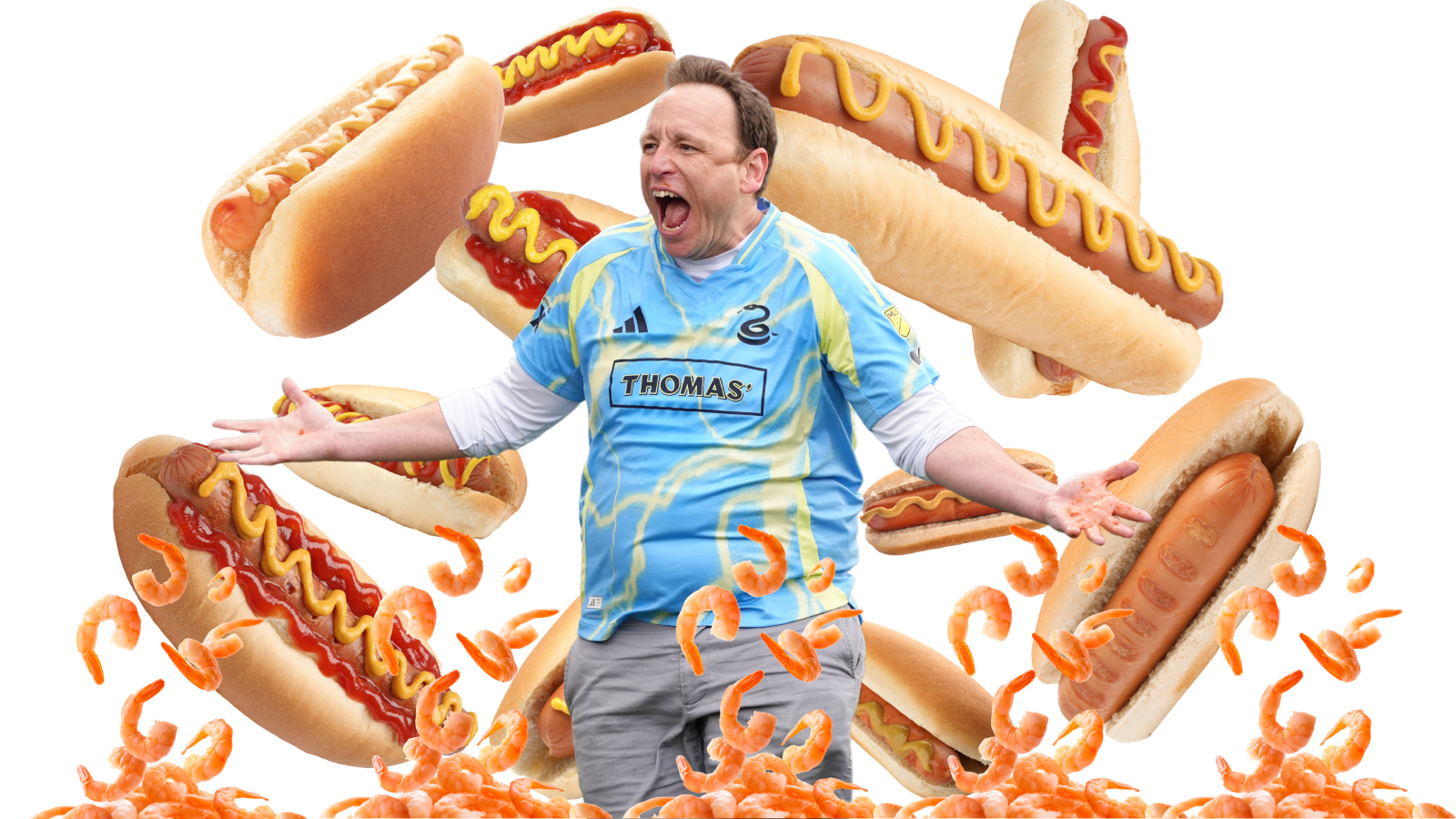 Joey Chestnut in front of hot dogs and shrimp