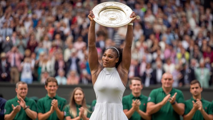 Serena Williams holds up Wimbledon trophy