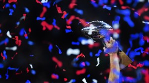 New England Patriots legend Tom Brady holds up Lombardi Trophy