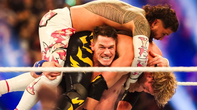 John-Cena-lifts-Jey-Iso-and-Logan-Paul