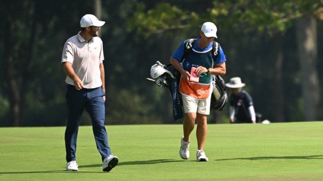 Scottie Scheffler and caddie at BMW Championship.