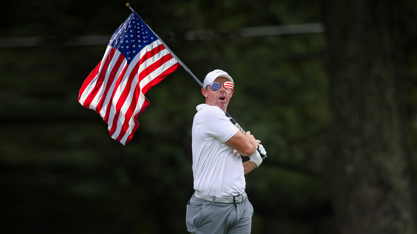 Rory McIlroy waving an American flag at the Ryder Cup