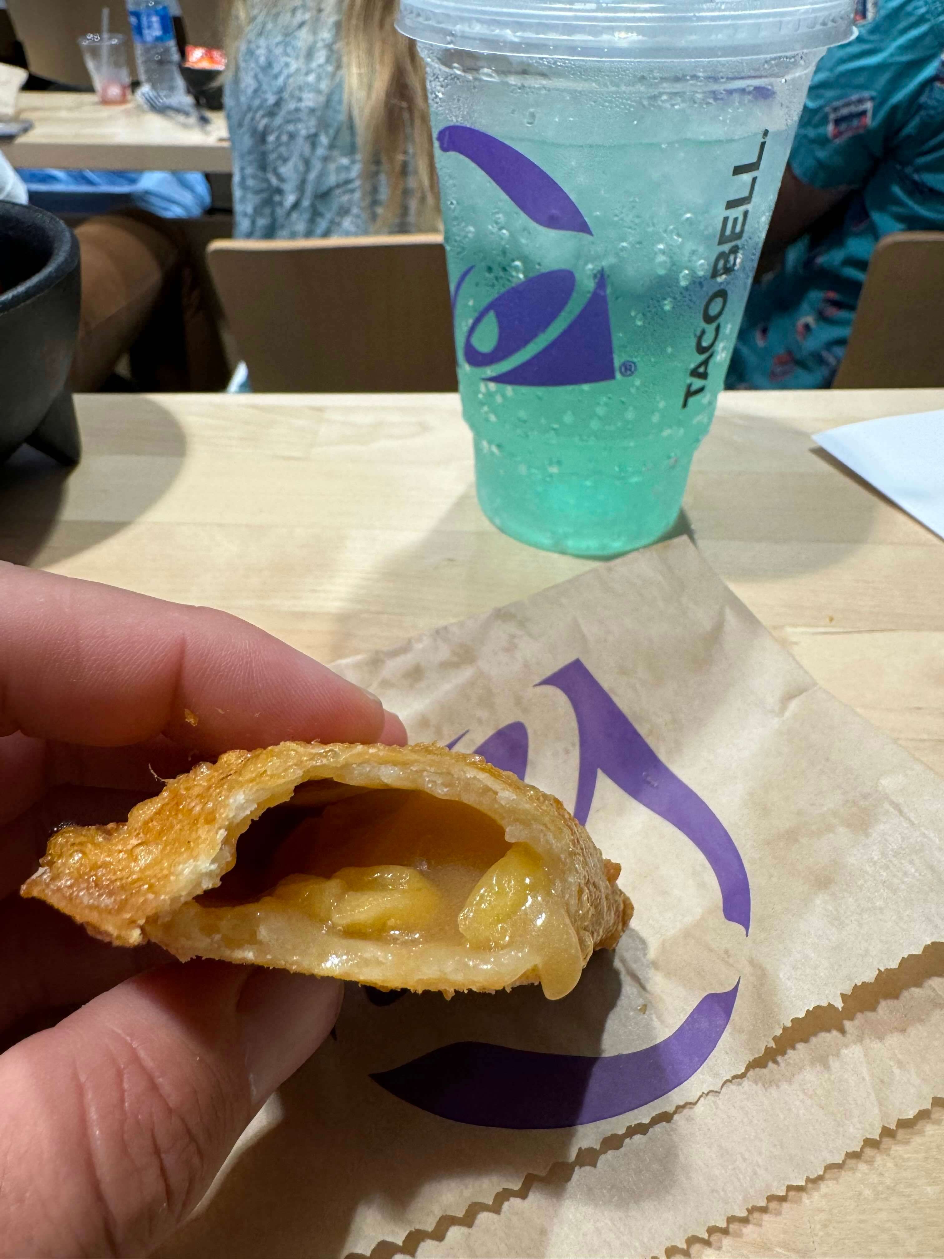 A Short History Of Taco Bell's Caramel Apple Empanada, The GOAT Of Fast