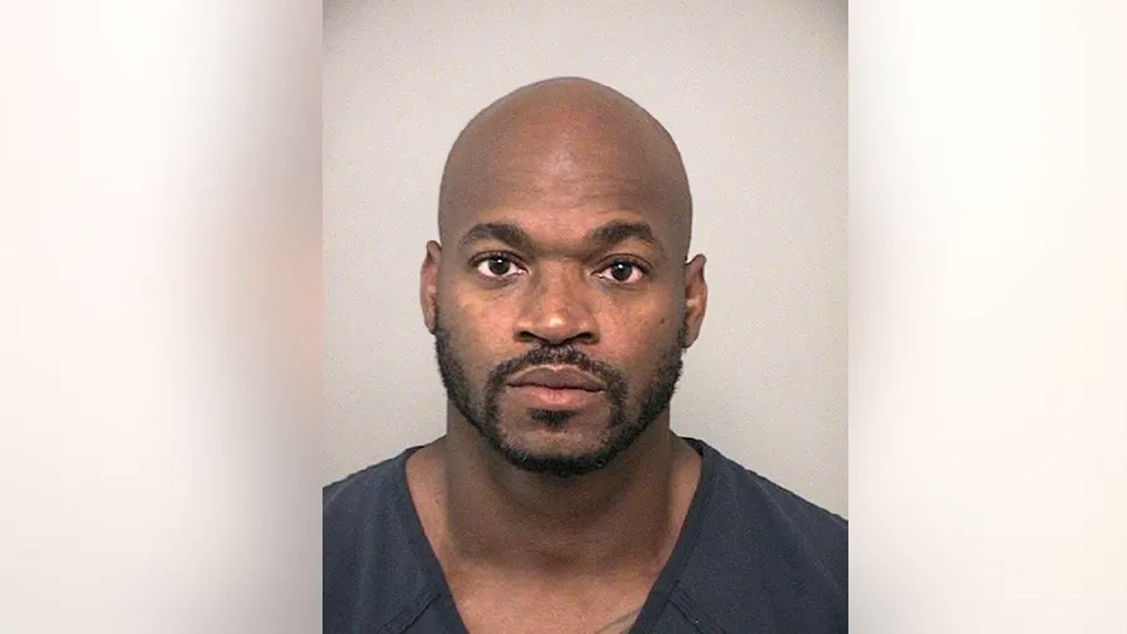 Former NFL Star Adrian Peterson's Mugshot Released After Arrest