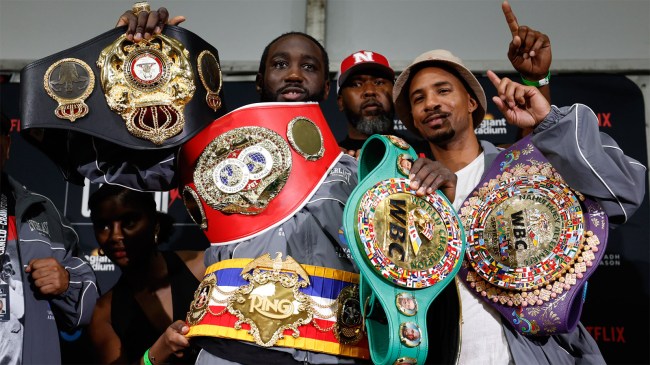 Terence-Crawford-with-his-belts-after-beaint-Canelo-Alvarez
