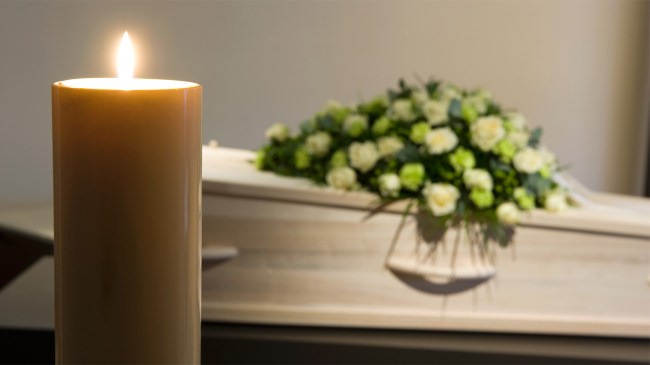 Burning-candle-in-front-of-coffin