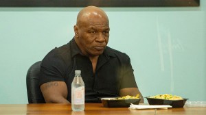 Mike-Tyson-takes-a-break-from-signing-autographs