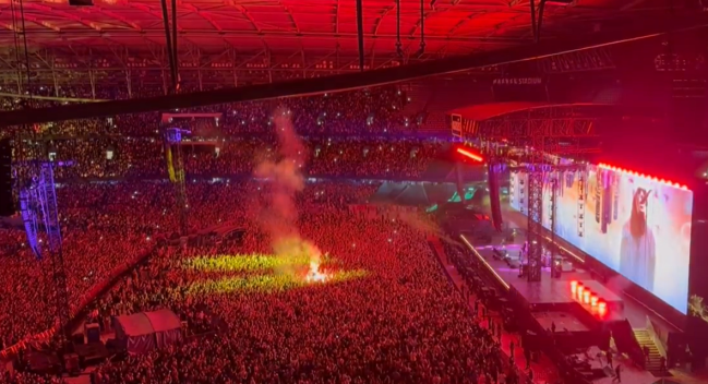 Fan sets off flare in crowd at Oasis concert in Melbourne