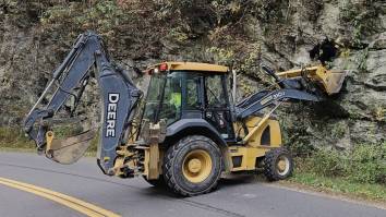 Tennessee Park Rangers Use Backhoe To Rescue Bear That Got Trapped On A Ledge In Great Smoky Mountains