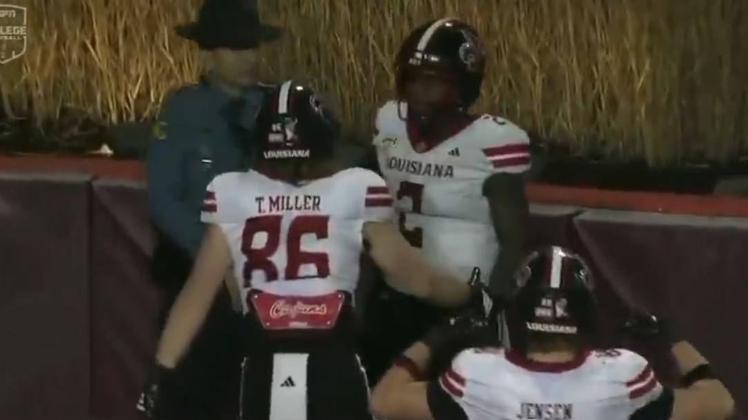 Louisiana Arkansas State Trooper Football Player Texas A&M Handshake
