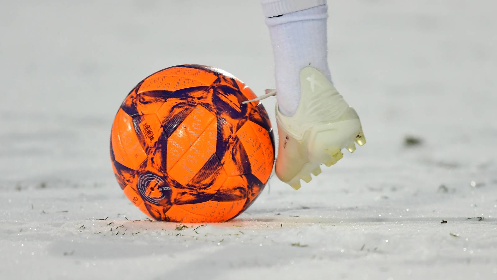 https://brobible.com/wp-content/uploads/2025/11/soccer-ball-snow.jpg