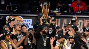 Los-Angeles-Lakers-forward-LeBron-James-hoists-the-NBA-Cup