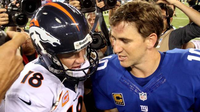 Peyton and Eli Manning after Broncos-Giants game