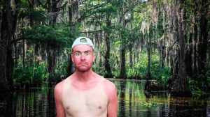 image of a sunburned Southern man in a bayou outside of New Orleans, Louisiana