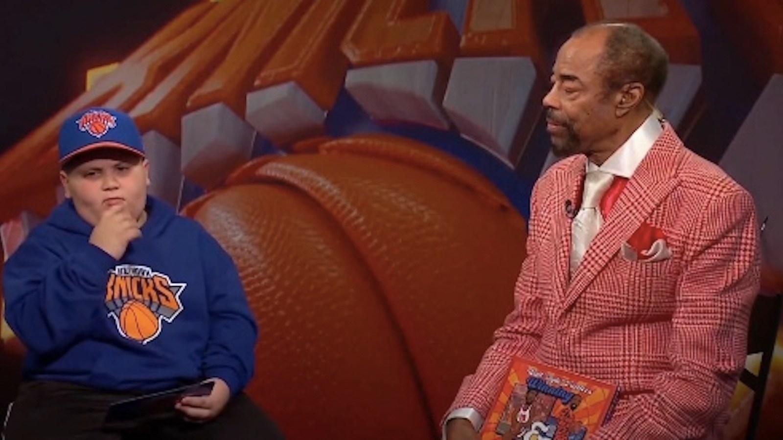 The Rizzler Backpack The Rizzler Taught Knicks Legend Clyde Frazier To Do The 'Rizz Face' In ...