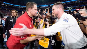 College Football coaches Curt Cignetti of Indiana and Dan Lanning of Oregon shake hands