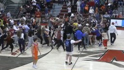 Kentucky High School Basketball Coach Forcibly Restrained For Charging At Player During Court Storm