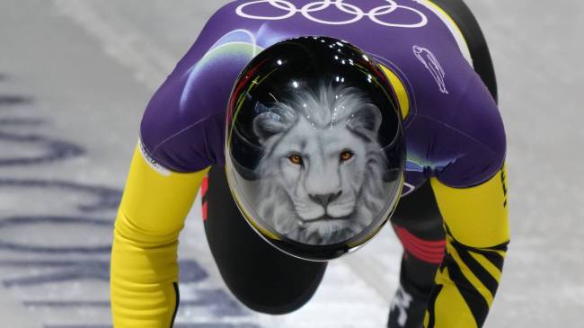 Belgian skeleton racer Kim Meylemans with lion helmet at 2026 Olympics