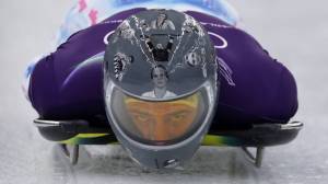 Ukrainian skeleton racer Vladyslav Heraskevych with helmet honoring war victims at 2026 Winter Olympics