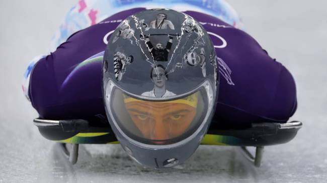 Ukrainian skeleton racer Vladyslav Heraskevych with helmet honoring war victims at 2026 Winter Olympics